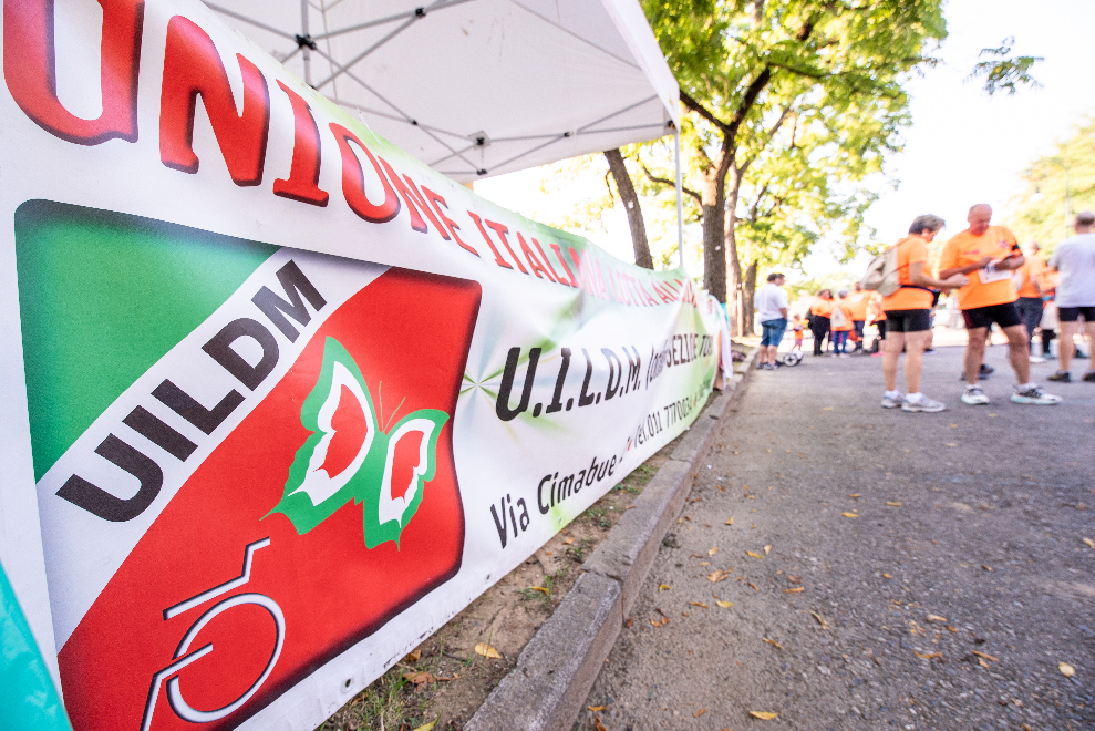lo striscione della Uildm sezione di torino